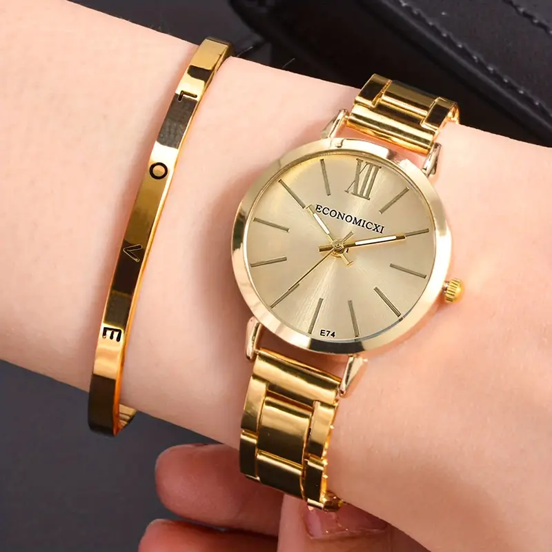 Big gold watch womens best sale